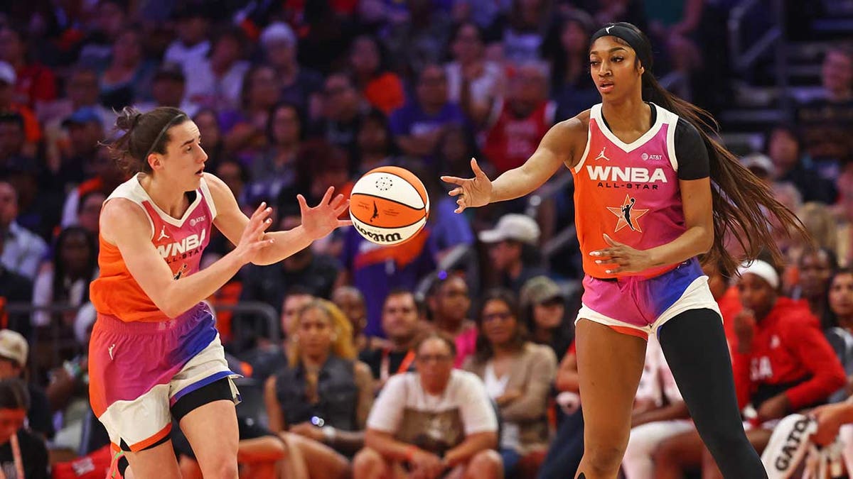Caitlin Clark gets pass from Angel Reese