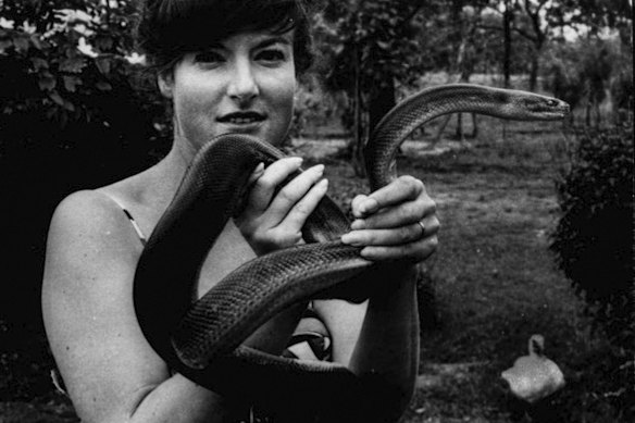 Nielsen was fearless. She is seen here with a python on a trip to Darwin.