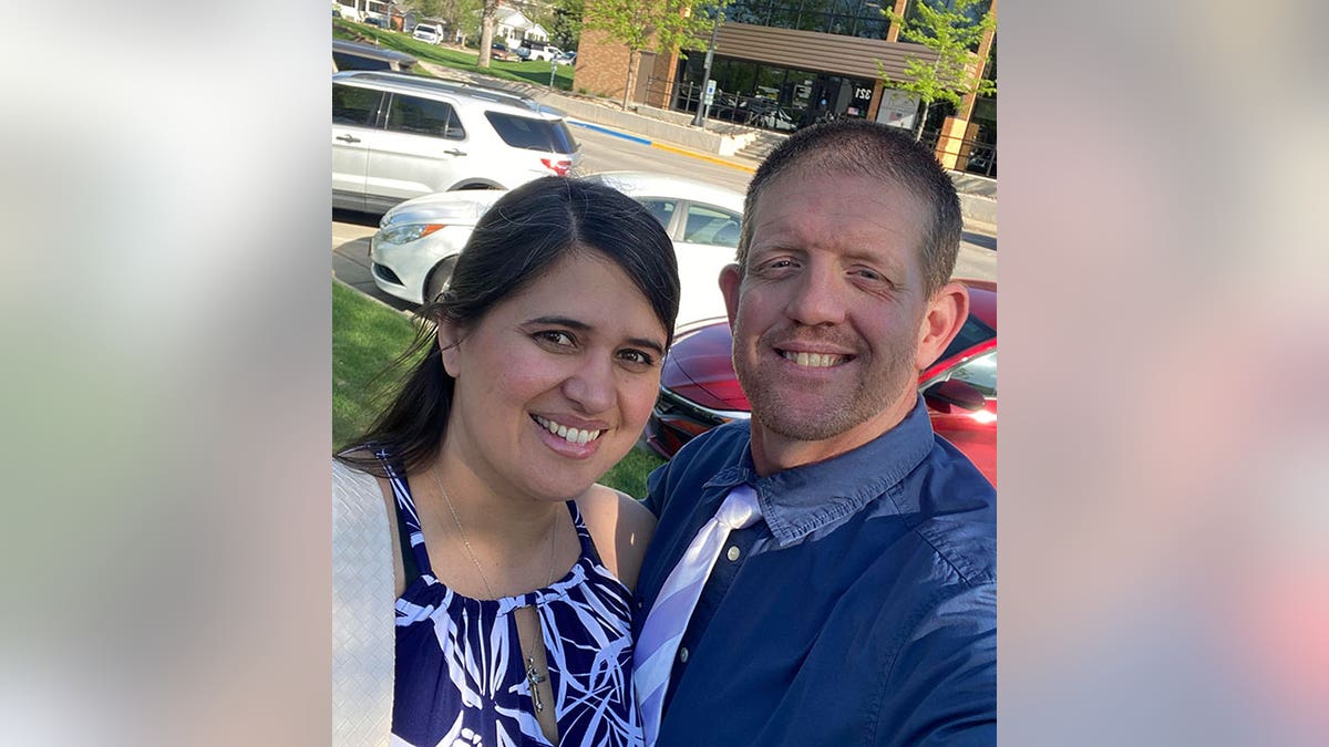 Cristen and Clinton Brink standing together and smiling