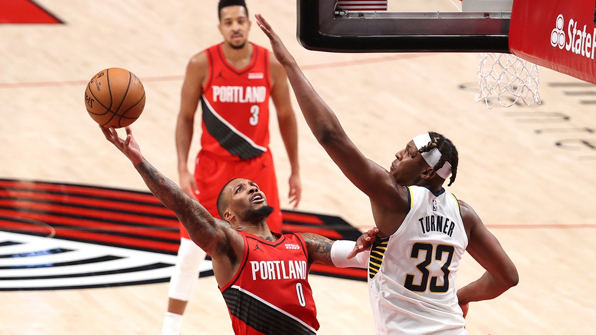 Damian Lillard and Myles Turner