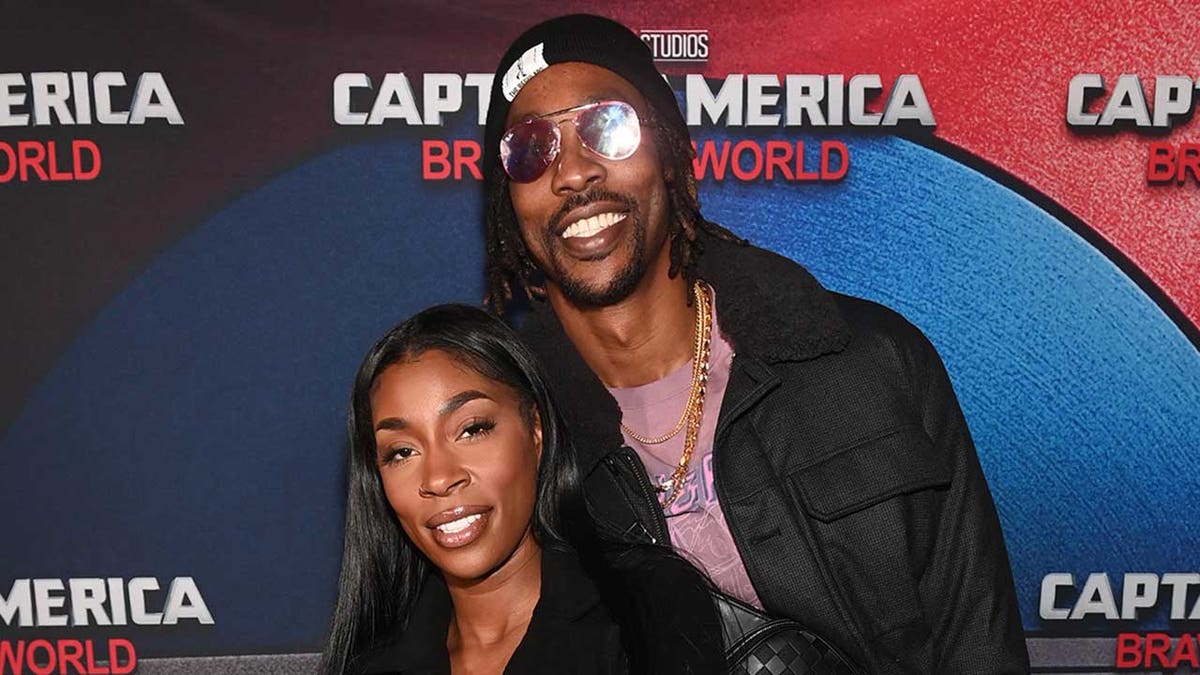 Dwight Howard and Amy Luciani on red carpet