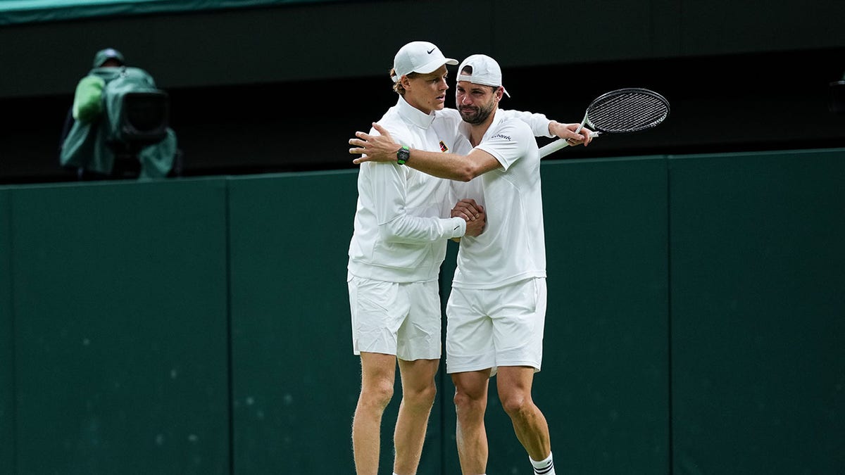 Grigor Dimitrov and Jannik Sinner embrace