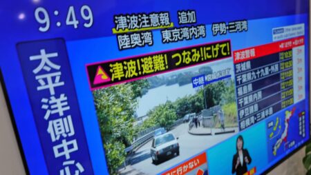 Japan warns of tsunami waves up to 3m after earthquake off Russian coast