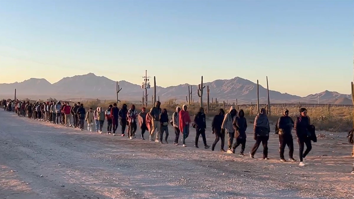 Migrants at border in Arizona in 2023