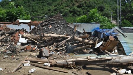 Monsoon peaks in south China, unleashing landslides, disease