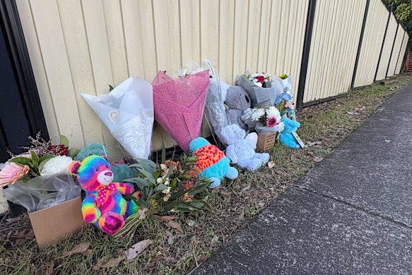 Flowers and stuffed animals left near the scene of the tragedy.