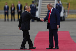 Body Language Expert Reacts to Trump-Putin Handshake