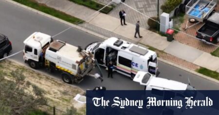 Mourners gather to honour baby found in Perth drain