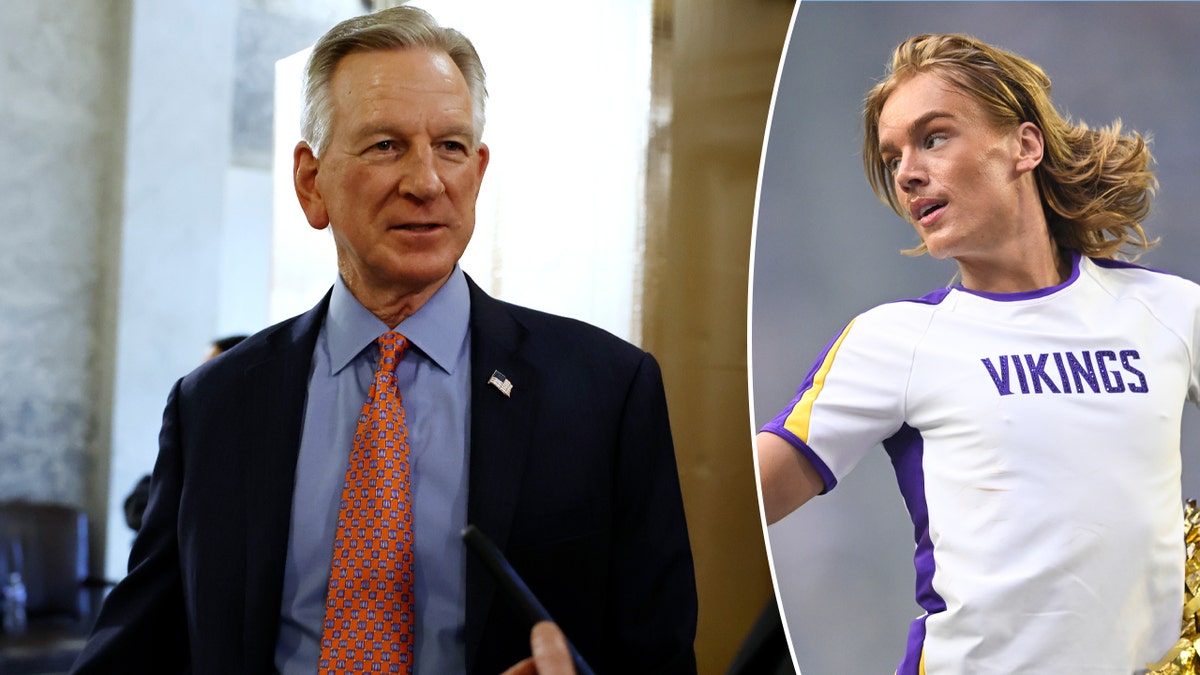 Tuberville and a male cheerleader