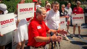 Gov. Brian Kemp endorses former football coach Derek Dooley outside Georgia stadium for 2026 US Senate bid