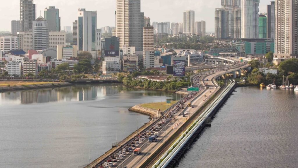 No plans to ‘fully liberalise’ cross-border ride hailing, but app bookings for licensed taxis being considered: LTA