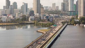 No plans to ‘fully liberalise’ cross-border ride hailing, but app bookings for licensed taxis being considered: LTA