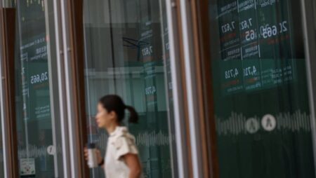 Asian markets diverge with eyes on Nvidia earnings