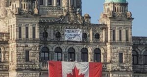 Protest banner on B.C. legislature at centre of security breach