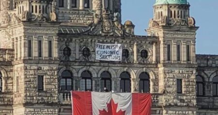 Protest banner on B.C. legislature at centre of security breach