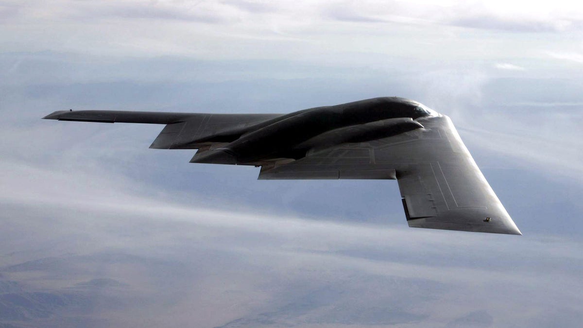 The B-2 flies over the Utah Testing and Training Range at Hill Air Force Base, Utah, during the test run Sept. 10, in which the B-2 dropped 80 inert Joint Direct Attack Munitions.