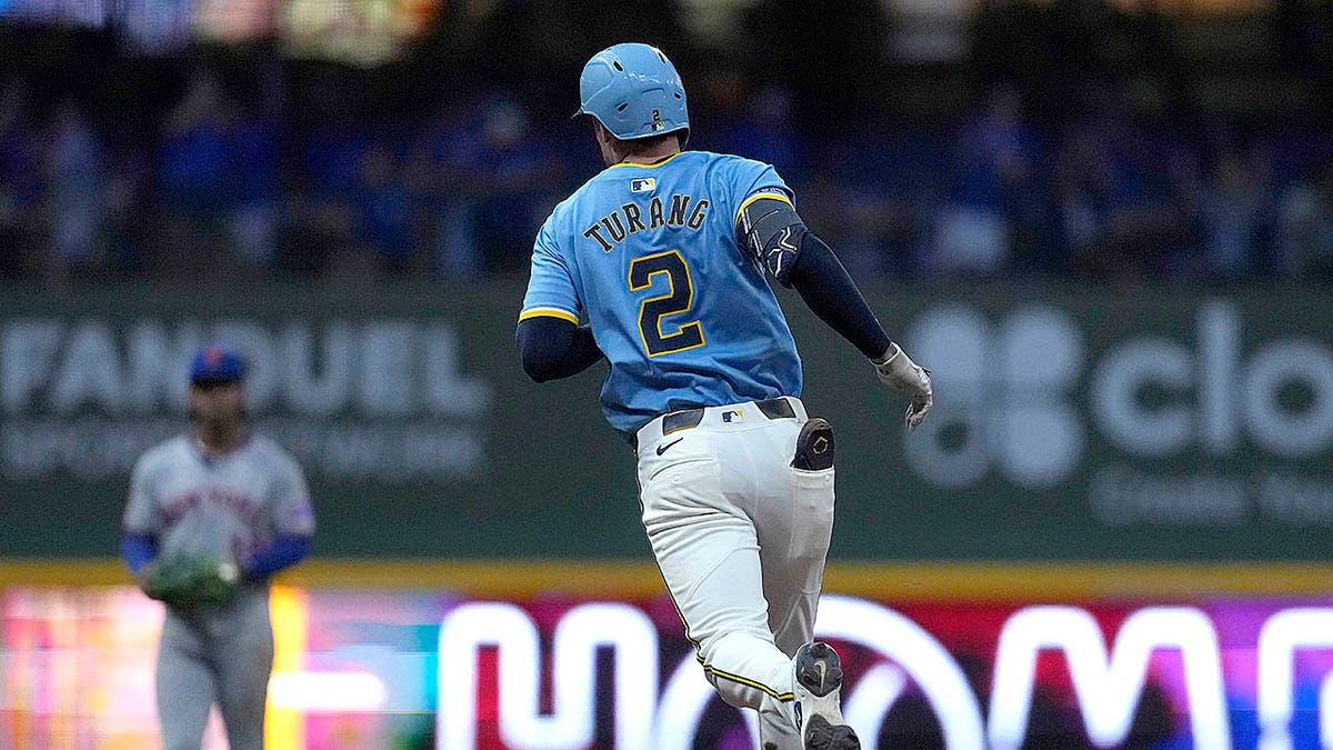 Brice Turang rounds bases