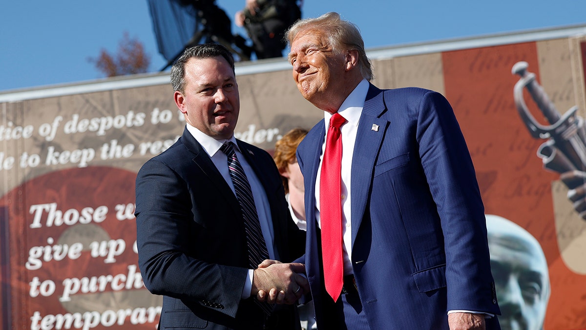 Trump shaking hands with Georgia Lt. Gov. Burt Jonnes in 2024