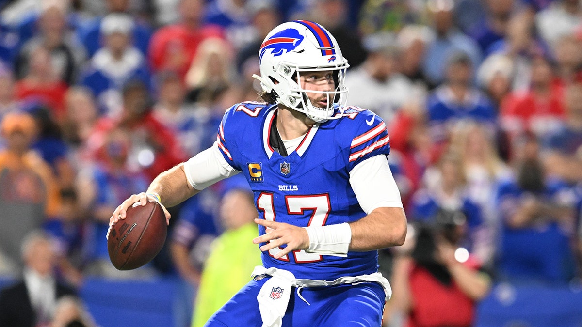 Josh Allen drops back