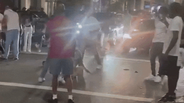 Cincinnati assault gif brawl middle of street at night