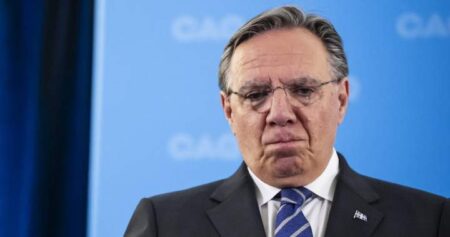 Quebec premier calls on auto insurance board to co-operate with anti-corruption police