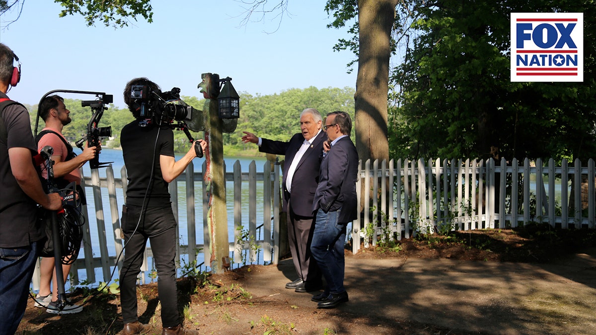 James P. Hoffa and Eric Shawn by the lake
