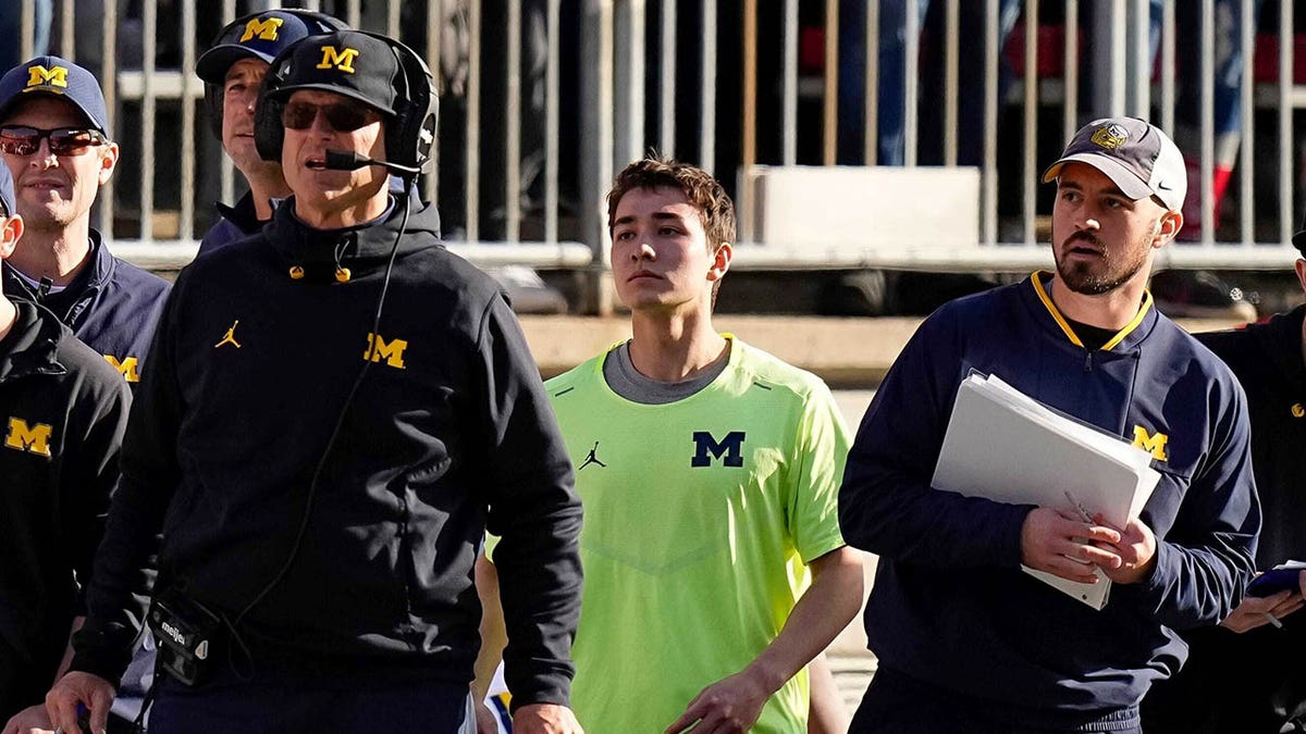 Jim Harbaugh and Connor Stalions