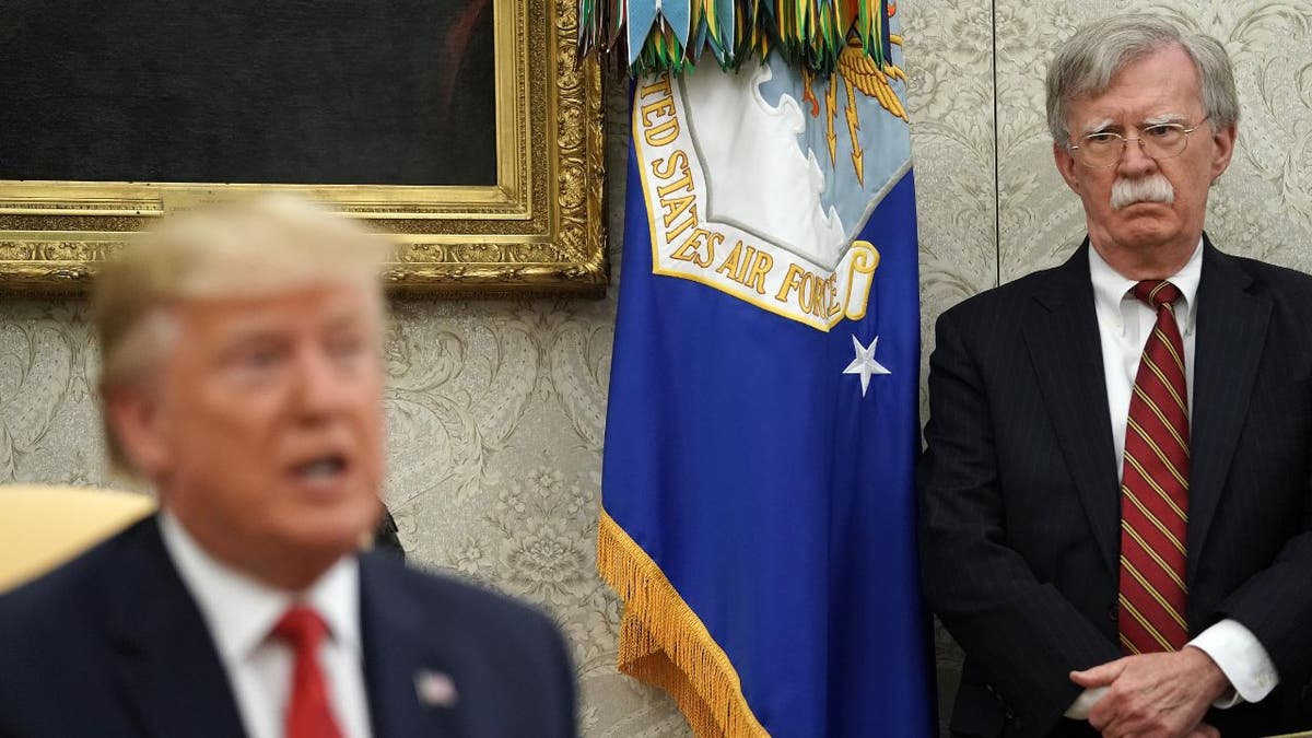 John Bolton and Donald Trump together at White House.