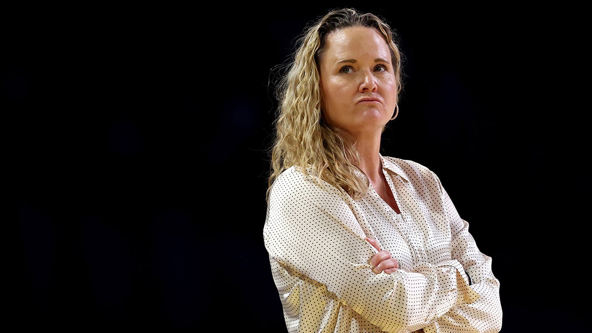 Head Coach Lynne Roberts sidelines