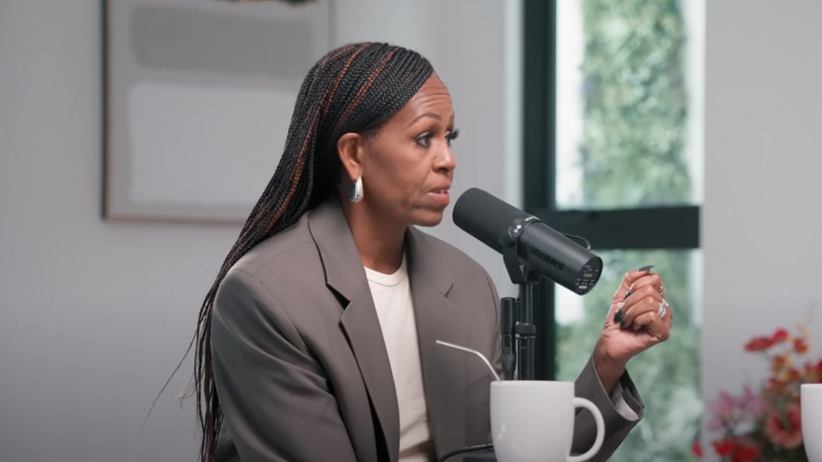 Michelle Obama talking into microphone
