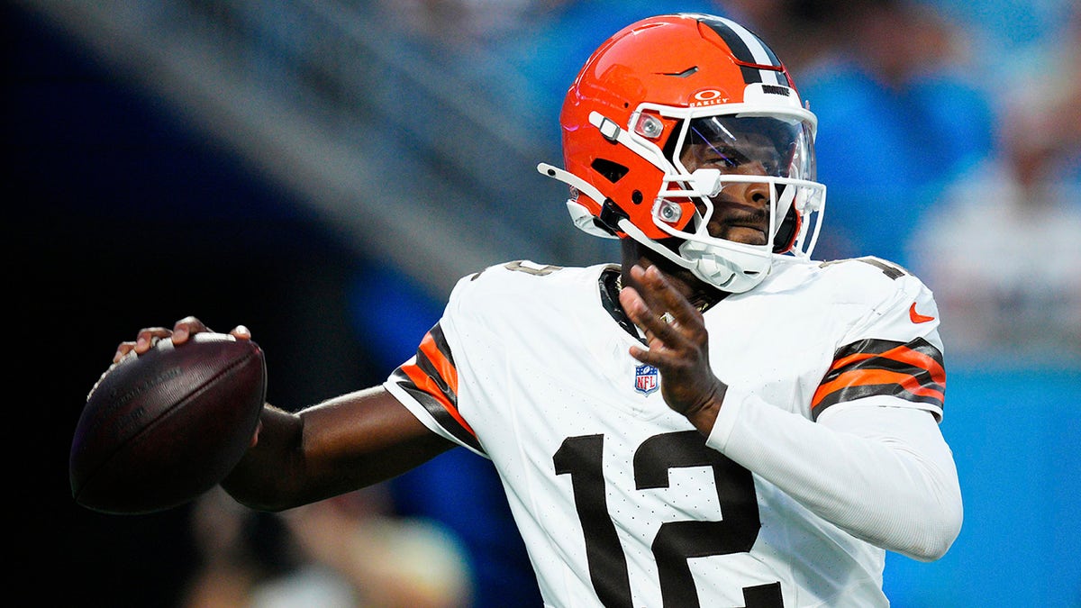 Shedeur Sanders looks down the field