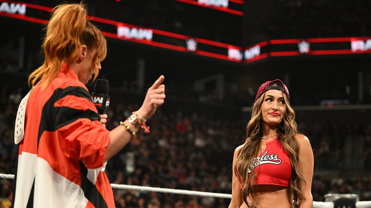 Nikki Bella and Becky Lynch in ring