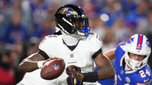 Ravens’ Lamar Jackson shoves fan after getting smacked in helmet following TD strike