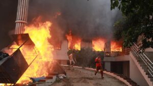 Nepal’s prime minister resigns as rioters burn leaders’ homes