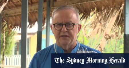Albanese quickly changes shirt after fashion faux pas at crucial summit