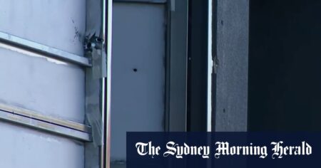 Sydney home with family inside sprayed with bullets