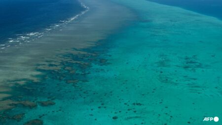 China says intercepted Philippine ships at disputed South China Sea shoal