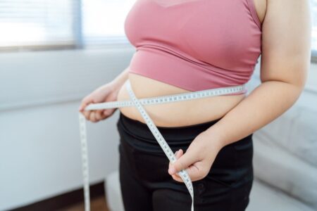 How sleep and stress are secretly fueling your belly fat