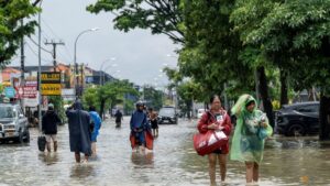 Bali floods kill 14, search continues for two missing