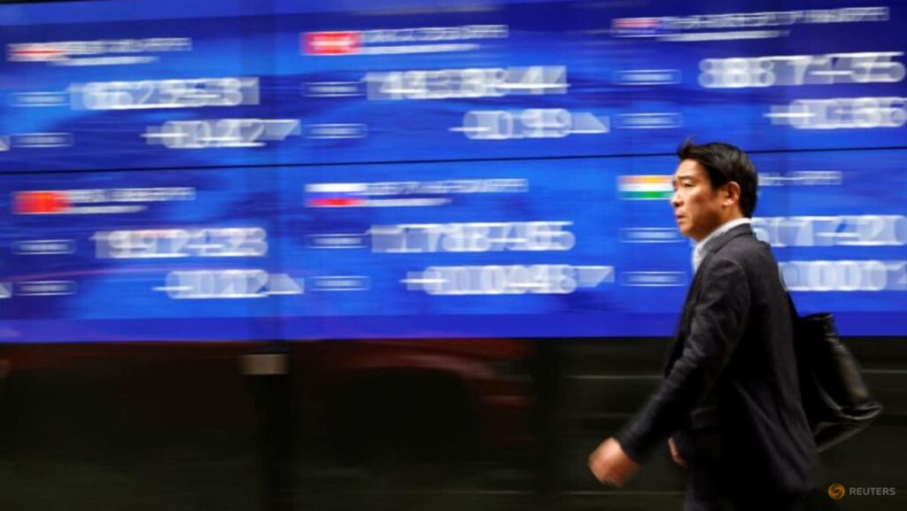 Stocks hesitate in Asia with a lot riding on the Fed