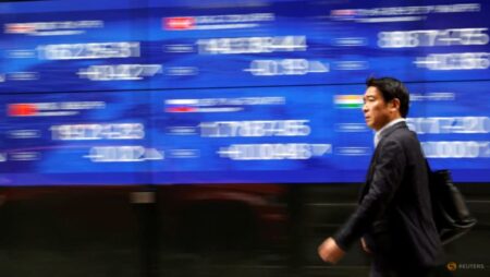 Stocks hesitate in Asia with a lot riding on the Fed
