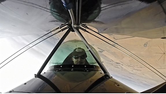 Nose camera view of Kingsley Just setting the Guinness world record for most consecutive rolls by an aircraft, 987, at Lethbridge on March 1, 2014.