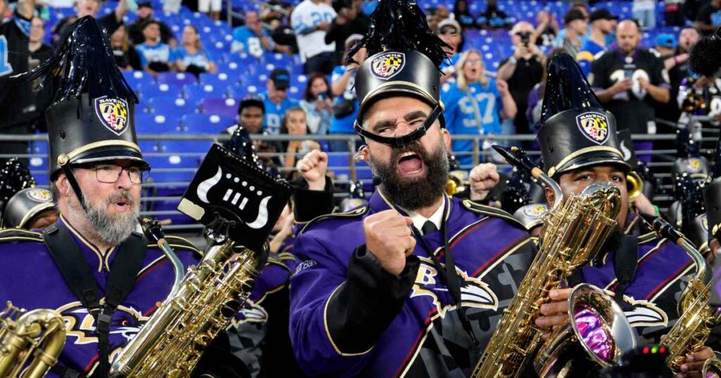 Jason Kelce Plays the Sax With the Baltimore Ravens Marching Band as Travis Kelce Cheers Him On
