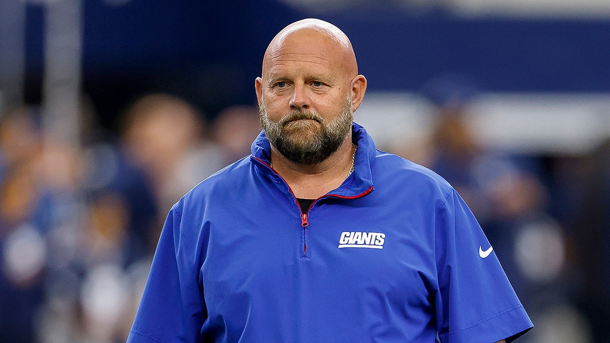Brian Daboll looks on field