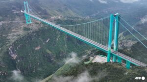 World’s highest bridge opens to traffic in China