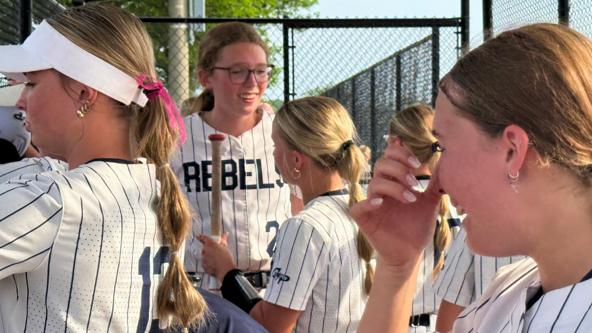 Softball players in the dugout