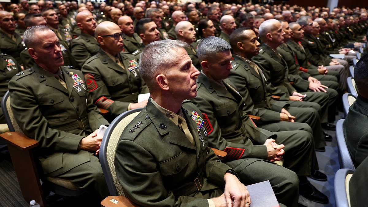 Members of the military attend a meeting convened by U.S. Defense Secretary Pete Hegseth at Marine Corps Base Quantico.