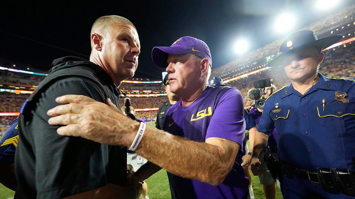 Brian Kelly and Billy Napier