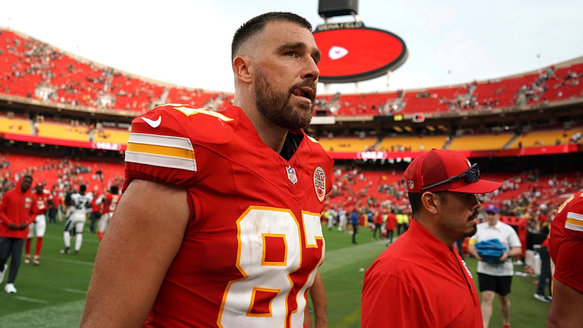 Travis Kelce walks off the field