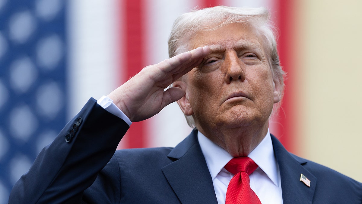 President Donald Trump salutes